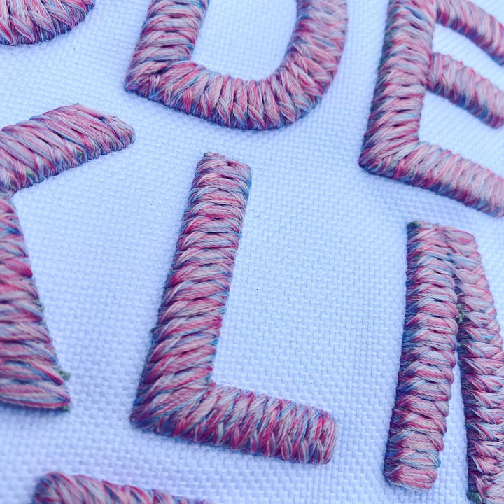 Textured letters spelling &