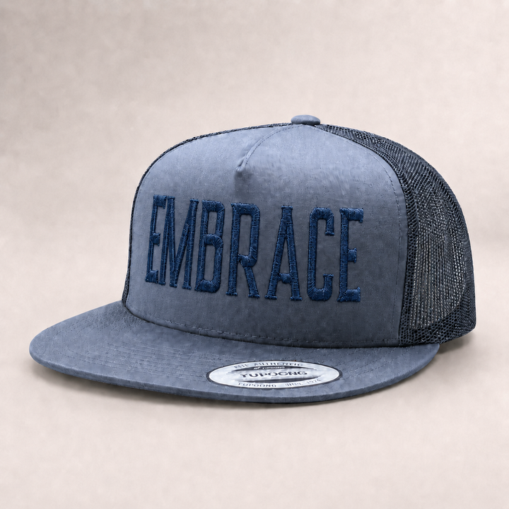 Blue trucker hat with &