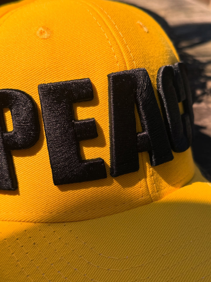 Yellow cap with &