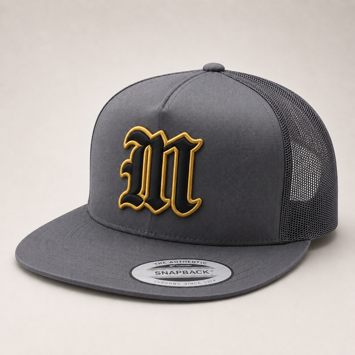 Gray snapback cap with gold and black letter &