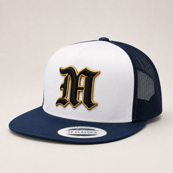White and navy trucker cap with black and gold letter &