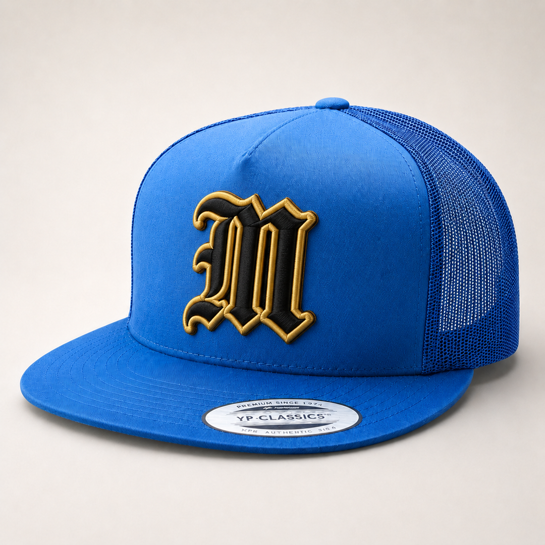 Blue cap with a large letter &