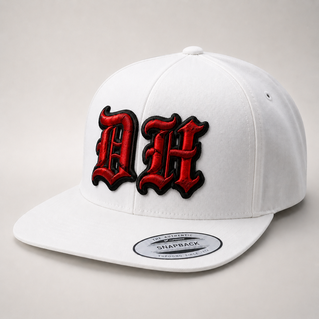 White cap with red and black logo on a light gray background
