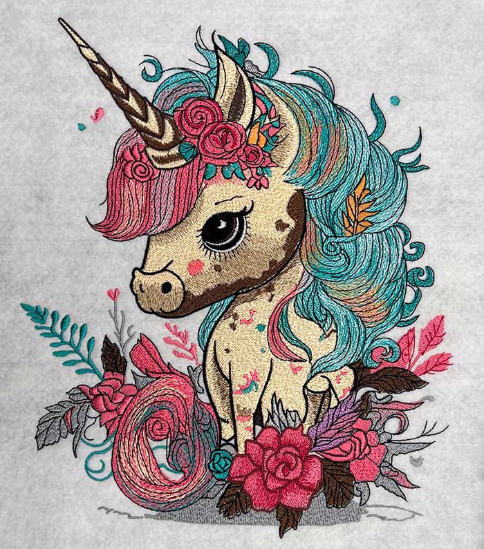 Colorful unicorn illustration with floral elements on a textured background