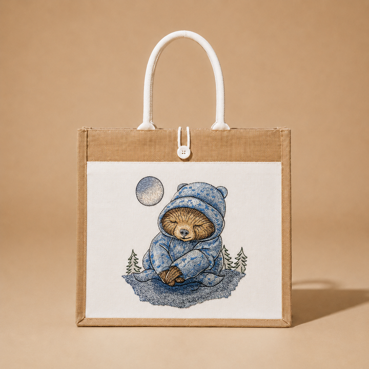 Tote bag with a bear illustration on a beige background