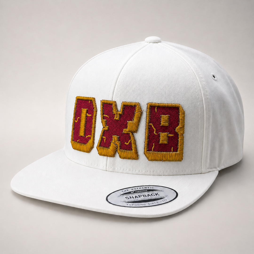 White cap with maroon and gold &