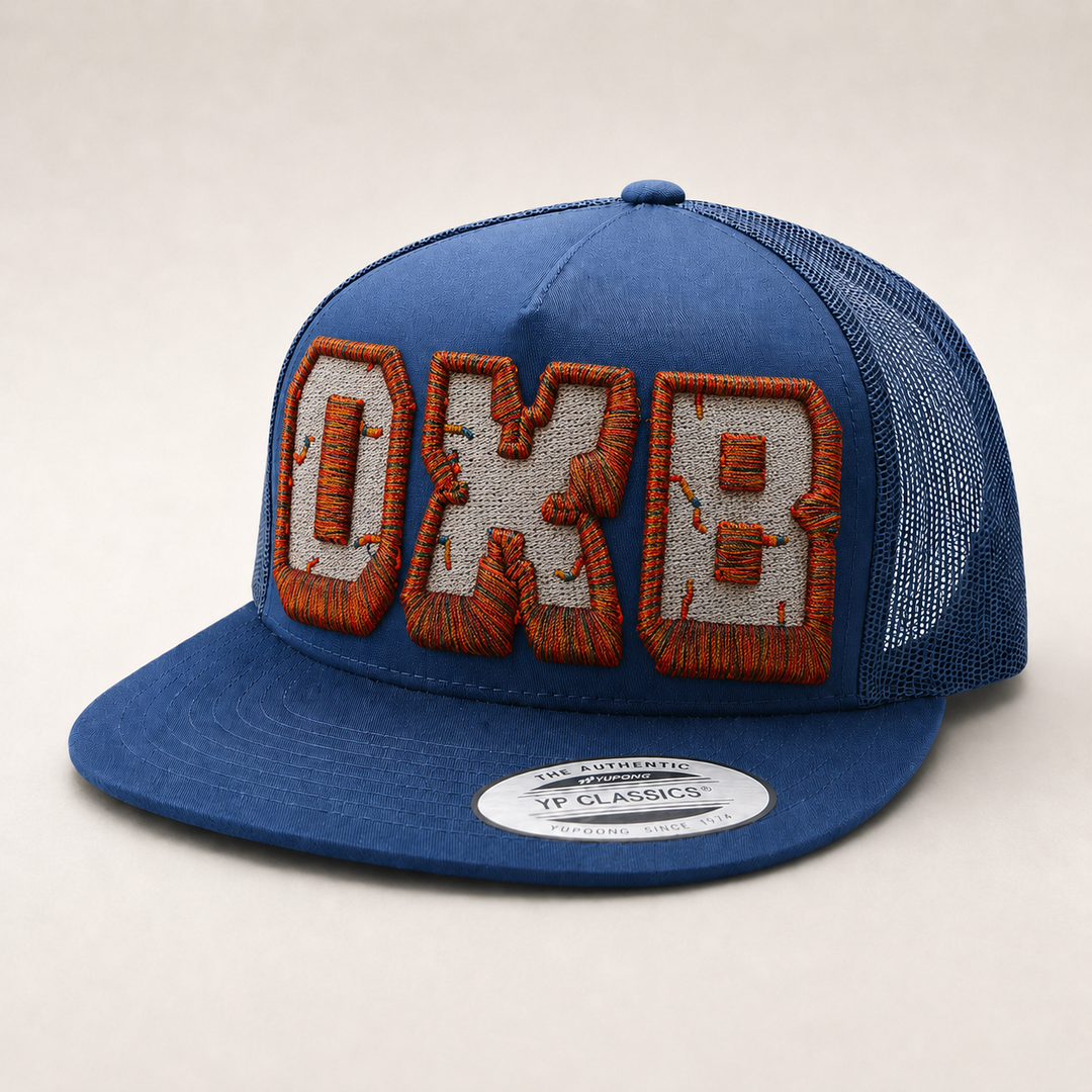 Blue trucker cap with &