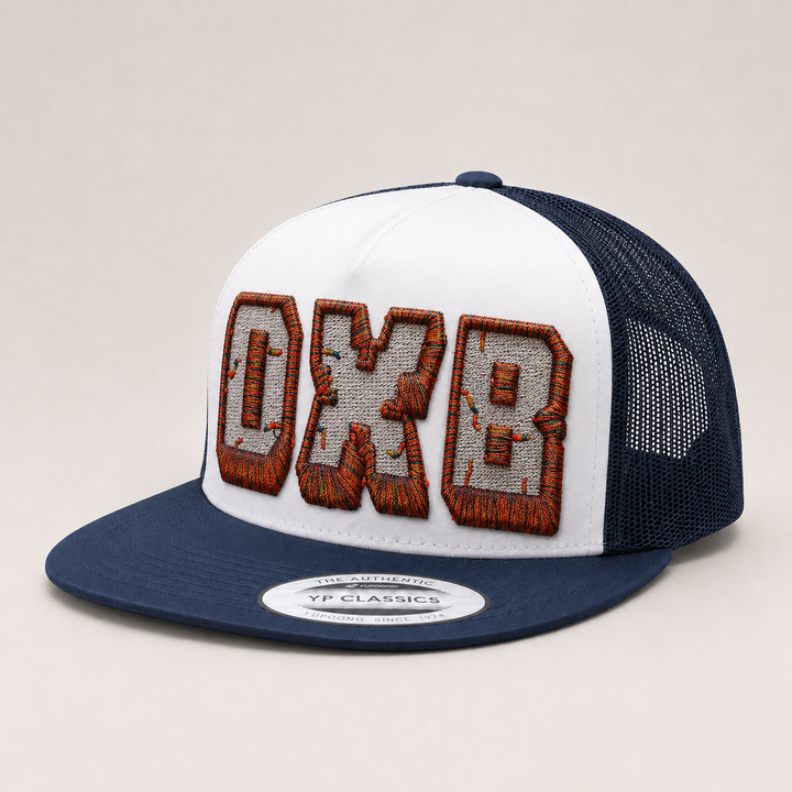 Trucker hat with embroidered text on a beige background