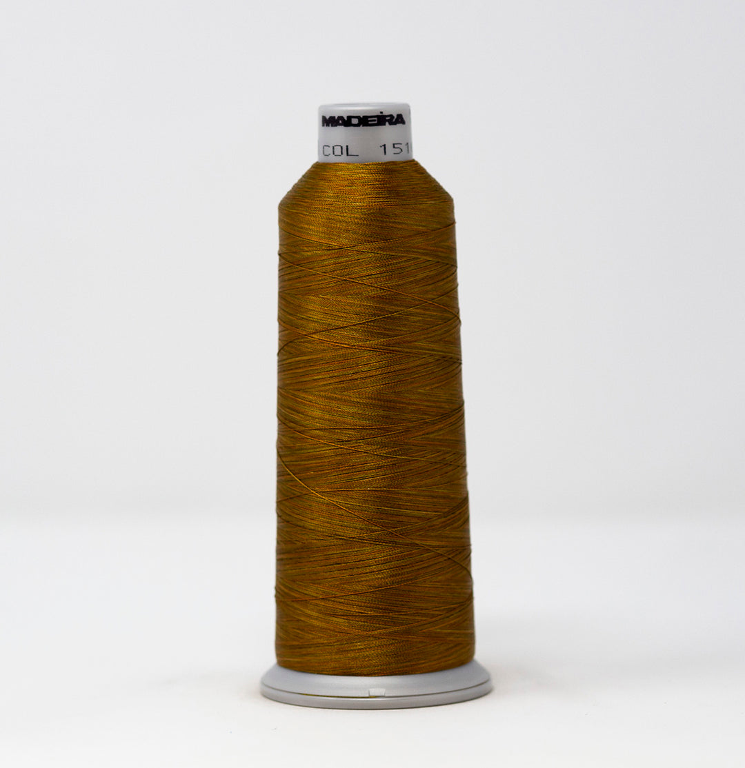 Spool of Madeira thread on a white background