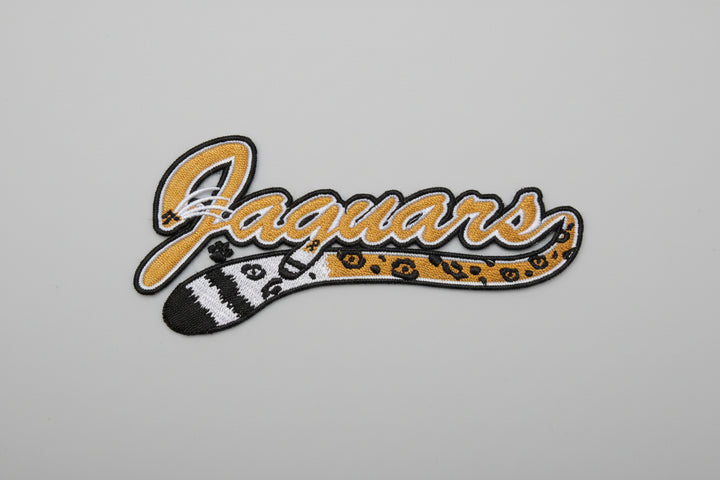 Embroidered patch with &