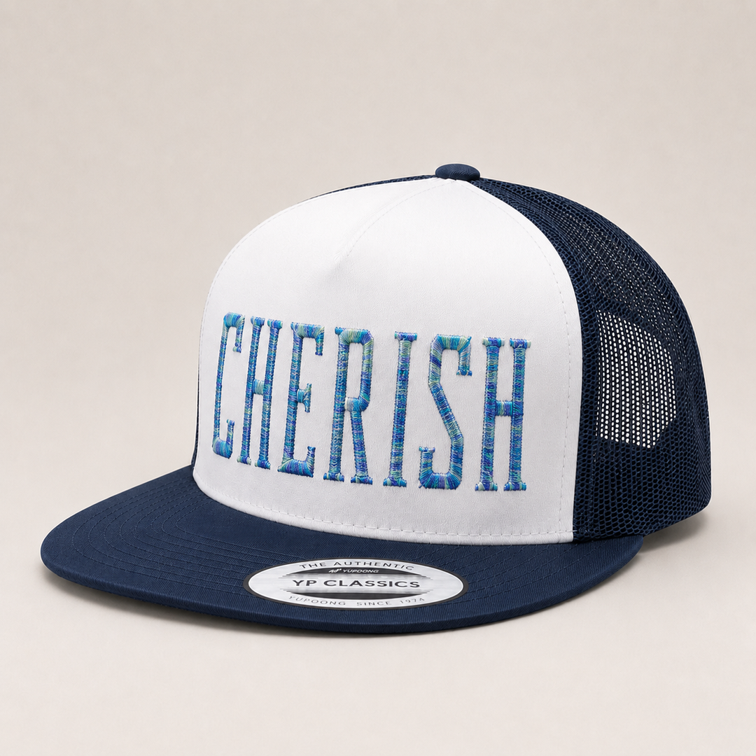 Navy and white cap with &