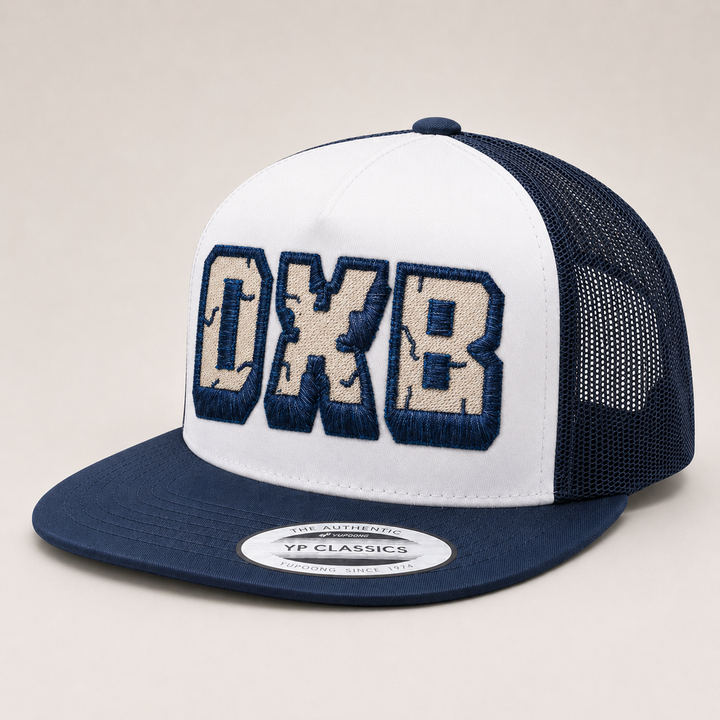 Navy and white cap with &