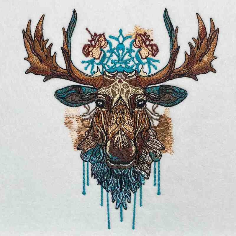 A tote bag with a moose embroidery design on the front.