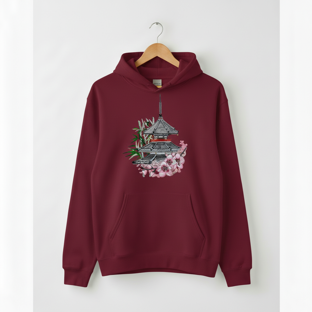 Maroon hoodie with a Japanese temple design on a white background