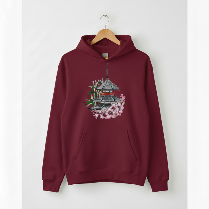 Maroon hoodie with a Japanese temple design on a white background