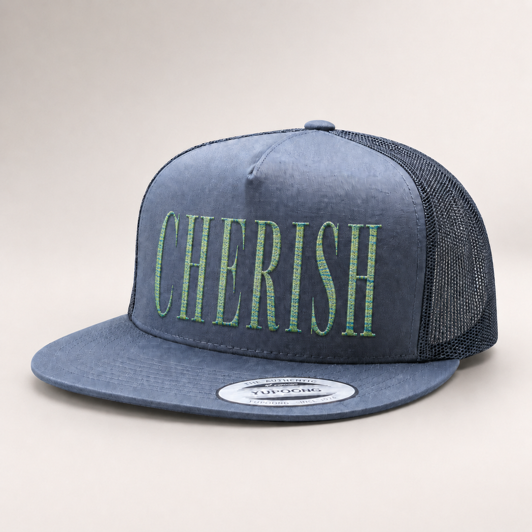 Blue trucker cap with &
