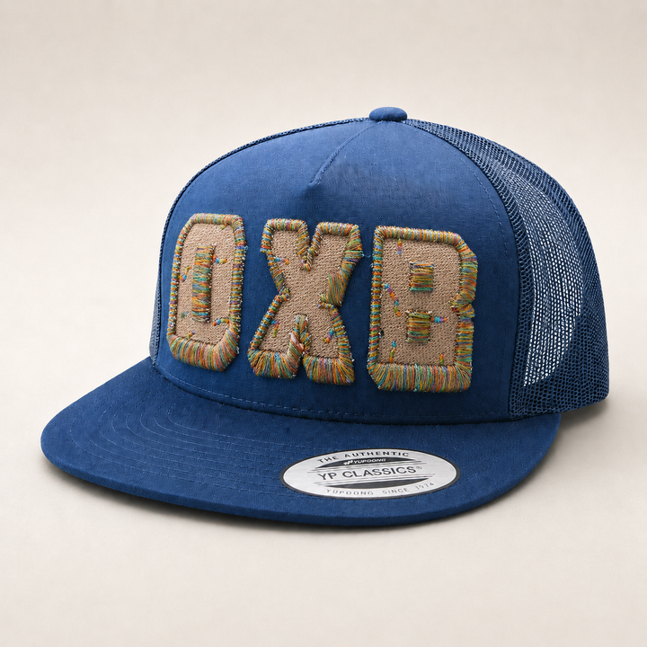 Blue trucker cap with &