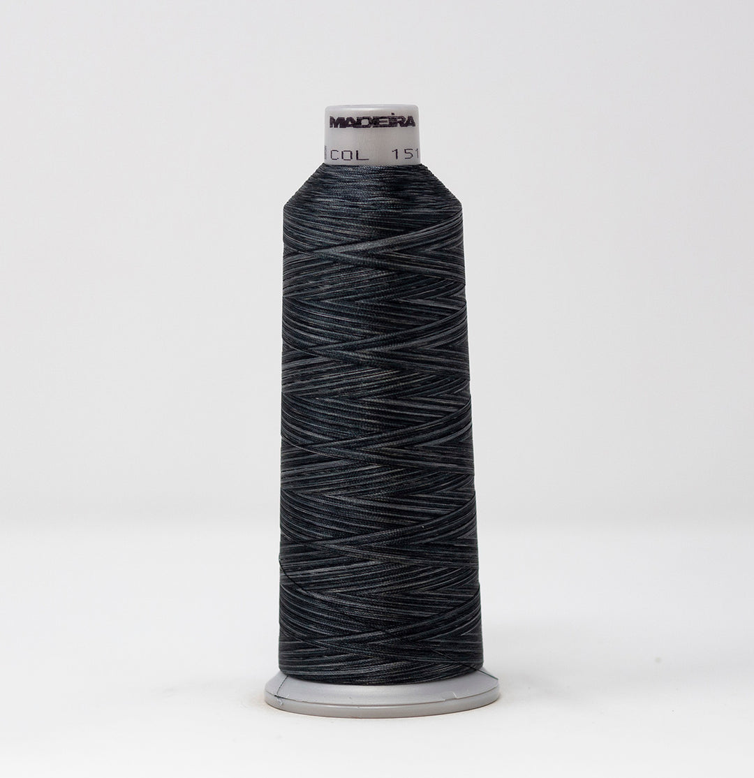 Spool of black thread with a visible brand label on a white background