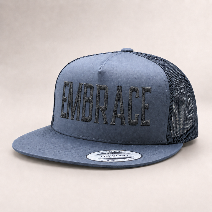 Blue trucker hat with &