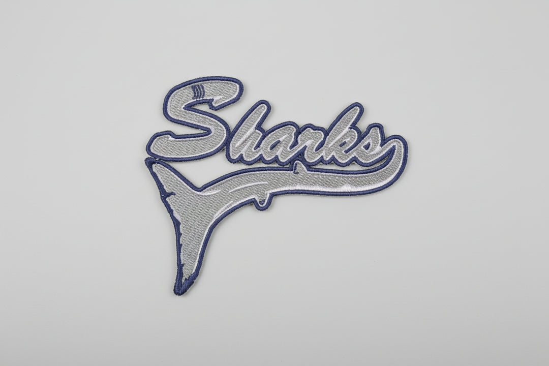 Embroidered patch with &