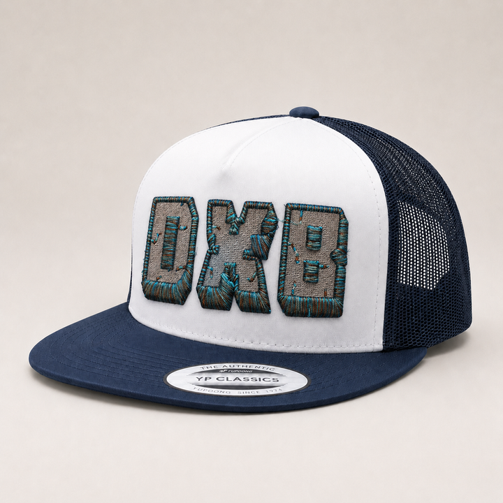 White and navy trucker hat with &