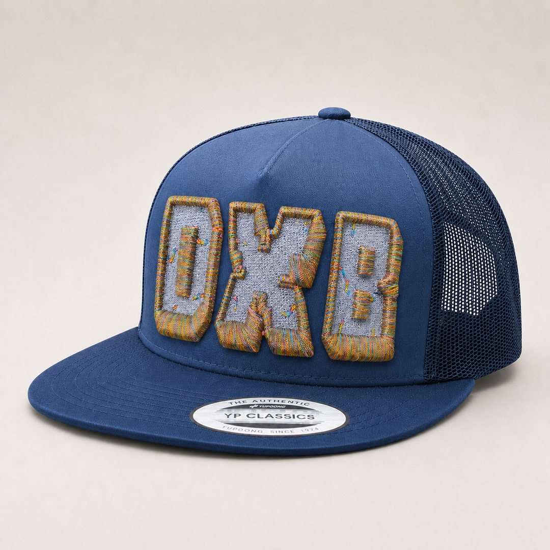 Blue trucker cap with &