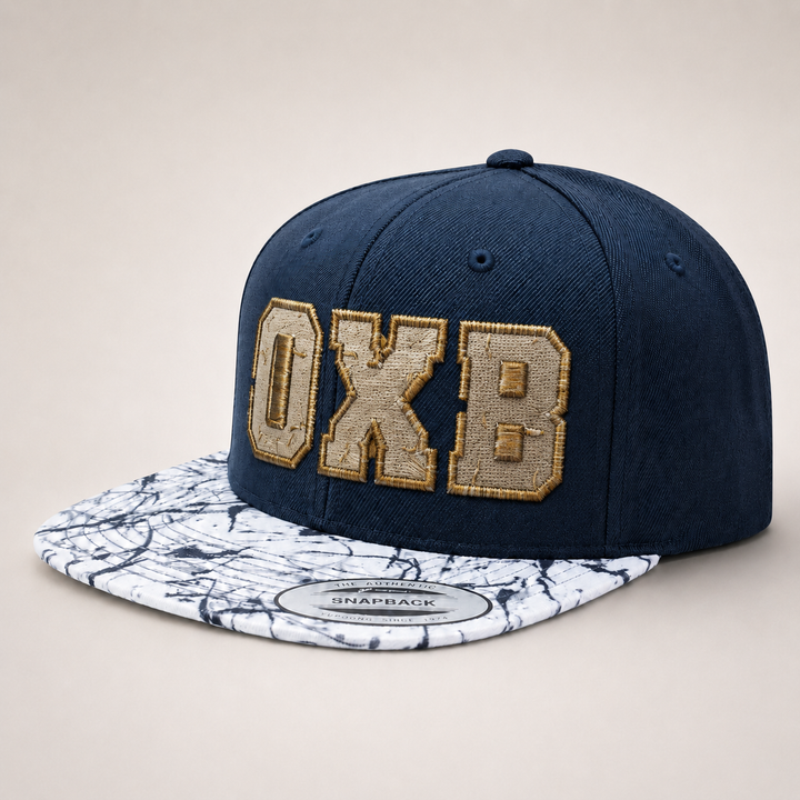 Navy blue snapback cap with gold &