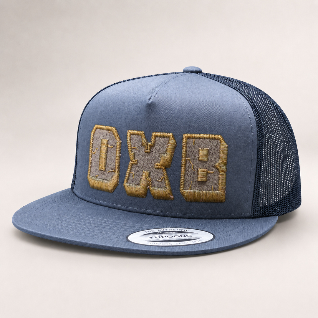 Blue trucker cap with &