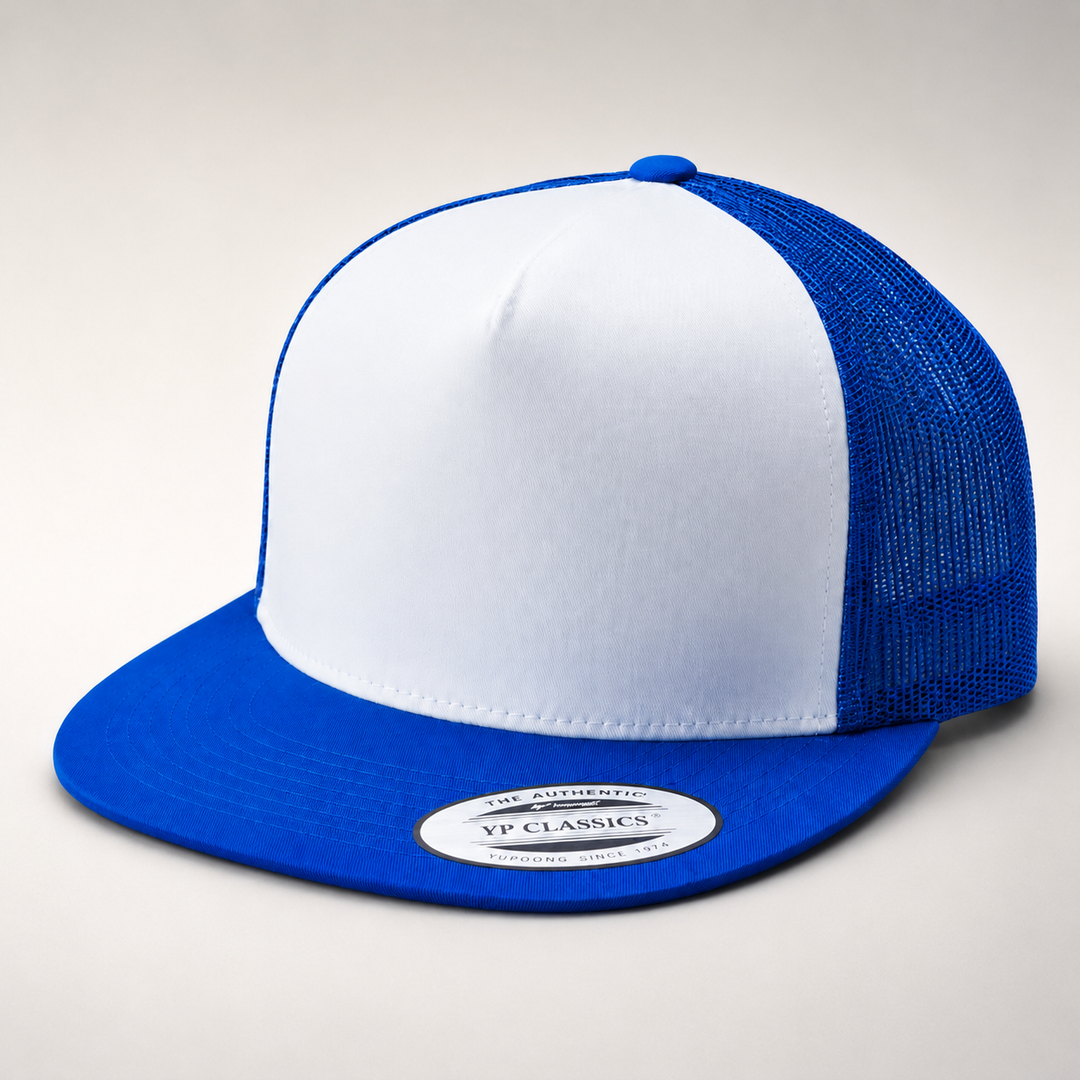 Blue and white trucker cap with a visible brand label on a light gray background