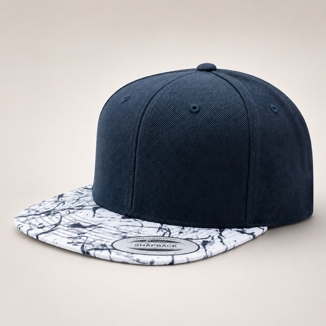 Navy blue snapback cap with a marble-patterned brim on a light beige background