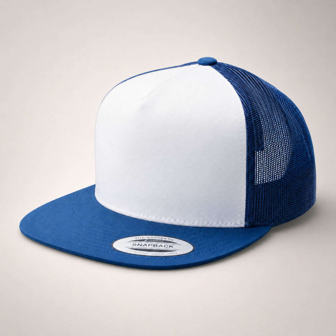 Blue and white trucker cap on a light gray background