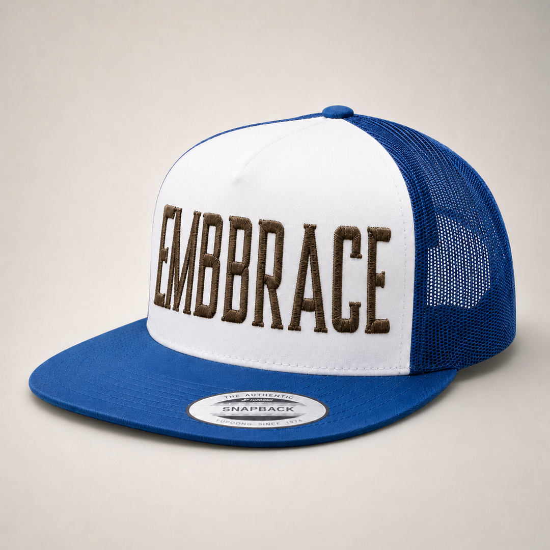 Blue and white trucker hat with &