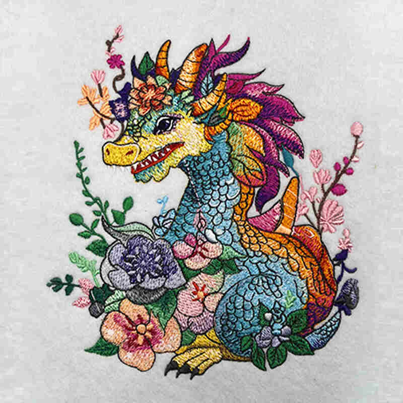 A colorful embroidered art piece depicting a dragon surrounded by floral designs, crafted on eco-friendly jute using organic threads.