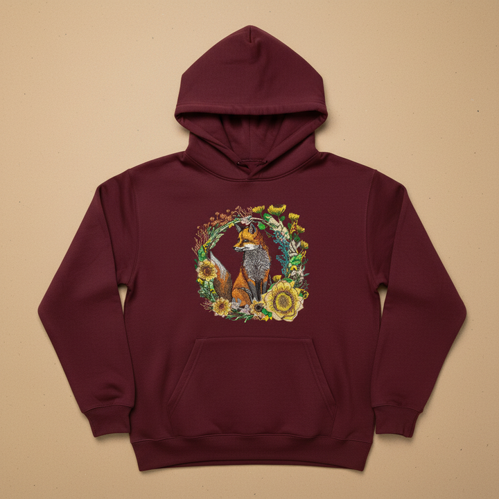 Maroon hoodie with a fox and floral design on a beige background