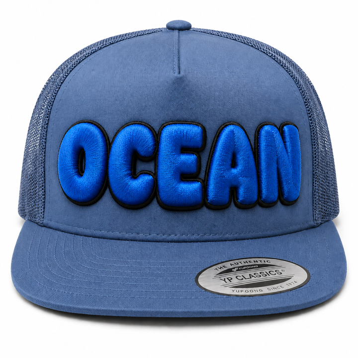 🔵⚫ Deep Ocean – Bubble Pop 3D Puff · Royal Blue fill · Black outline · Steel Blue Trucker | Hand Finished in Dubai | EmbroMania