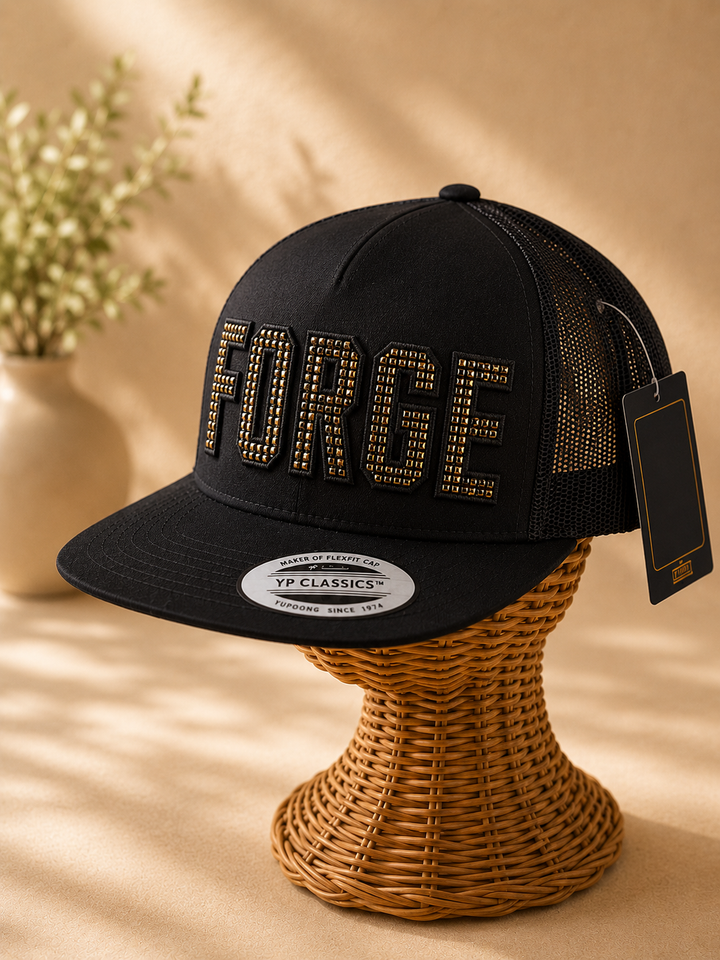 Onyx Grid – ChainPop 3D Puff · Gold puff · Black chain stitch on top · Black flat trucker | Hand Finished in Dubai | EmbroMania