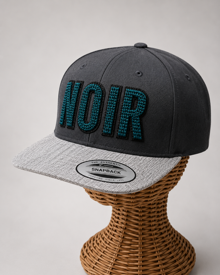 Phantom – ChainPop 3D Puff · Teal puff · Black chain stitch on top · Charcoal heather grey snapback | Hand Finished in Dubai | EmbroMania