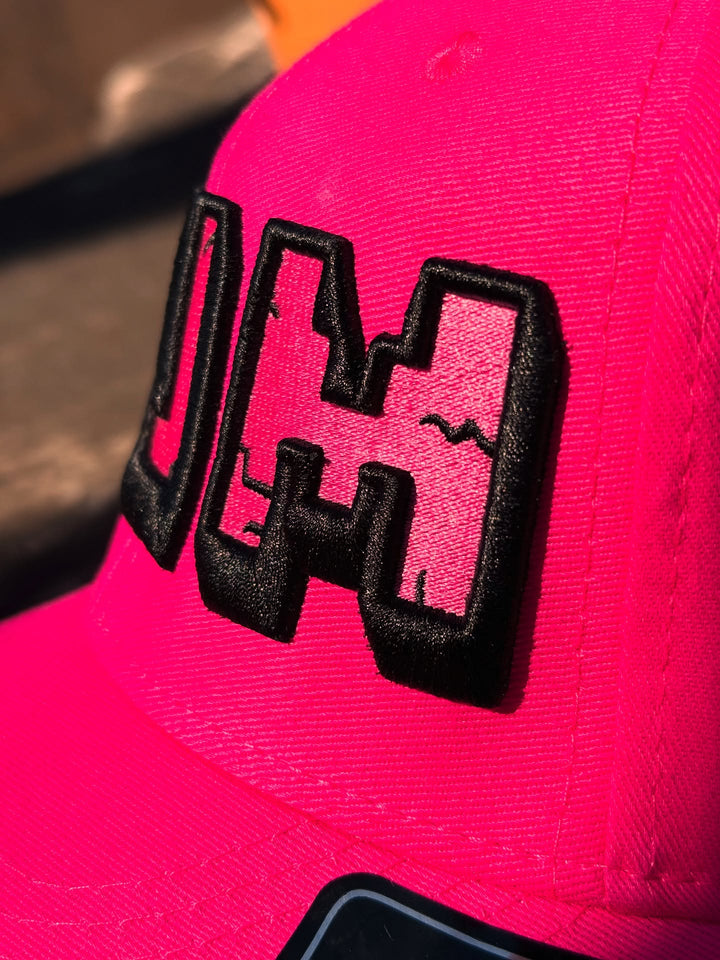 Close-up of Cracked 3D Puff cap embroidery with variegated multicolour thread outline | Hand Finished in Dubai | EmbroMania
