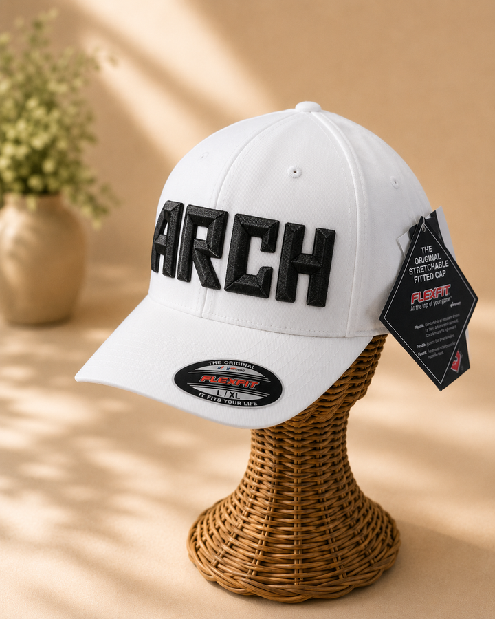 Pitch &amp; Pearl – DiamondCut 3D Puff · Black geometric faceted puff · White Solid Flexfit | Hand Finished in Dubai | EmbroMania