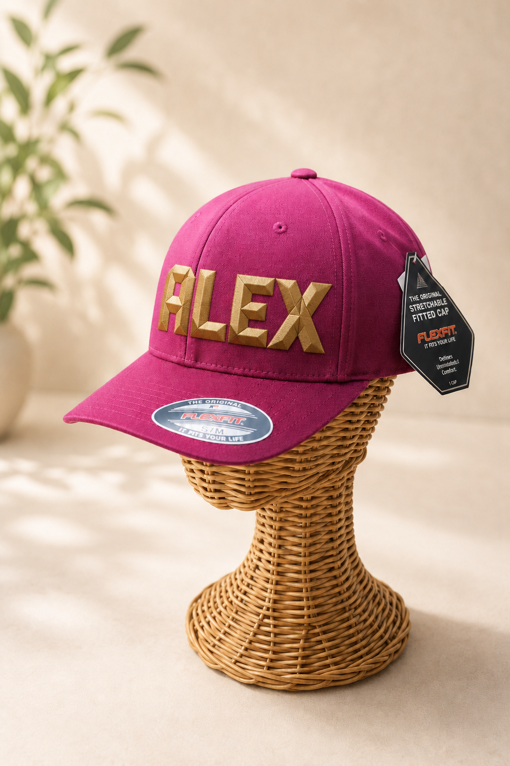 DiamondCut geometric faceted embroidery spelling ALEX in Heritage Cut — burgundy snapback with gold 3D puff