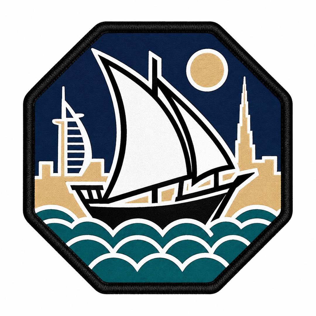 Dubai Dhow Horizon embroidery patch featuring a traditional dhow sailboat against the Dubai skyline on a navy octagon crest | Hand Finished in Dubai | EmbroMania