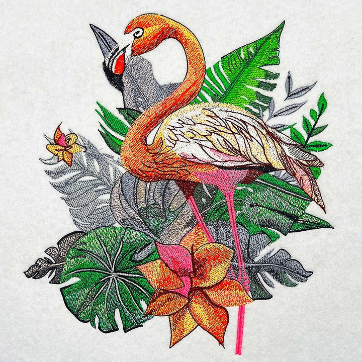 Flamingo Solo Machine Embroidered Hoodie – Design detail of elegant single flamingo with tropical foliage | Hand Finished in Dubai