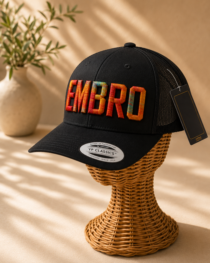 🌅 Ember – Metro Block 3D Puff · Orange red amber gold teal variegated · Black curved trucker | Hand Finished in Dubai | EmbroMania