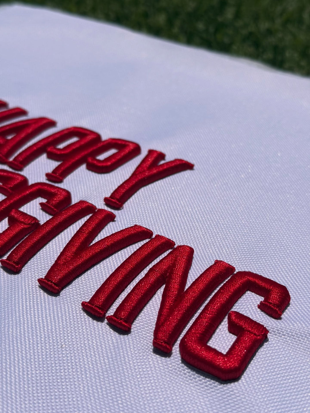 Close-up of Metro Block 3D Puff embroidery showing raised foam letterforms and satin-stitch detail | Hand Finished in Dubai | EmbroMania