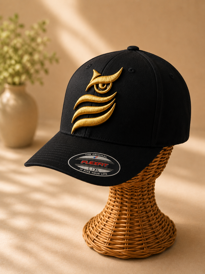 ✨🦉 Gilt Vigil – Midnight Sentinel Owl · Gold puff · Black Solid Flexfit | Hand Finished in Dubai | EmbroMania