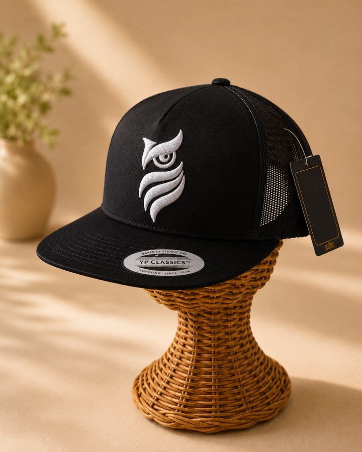 🖤🌙 Midnight Sentinel – Midnight Sentinel Owl · White puff · Black Flat Trucker YP Classics | Hand Finished in Dubai | EmbroMania