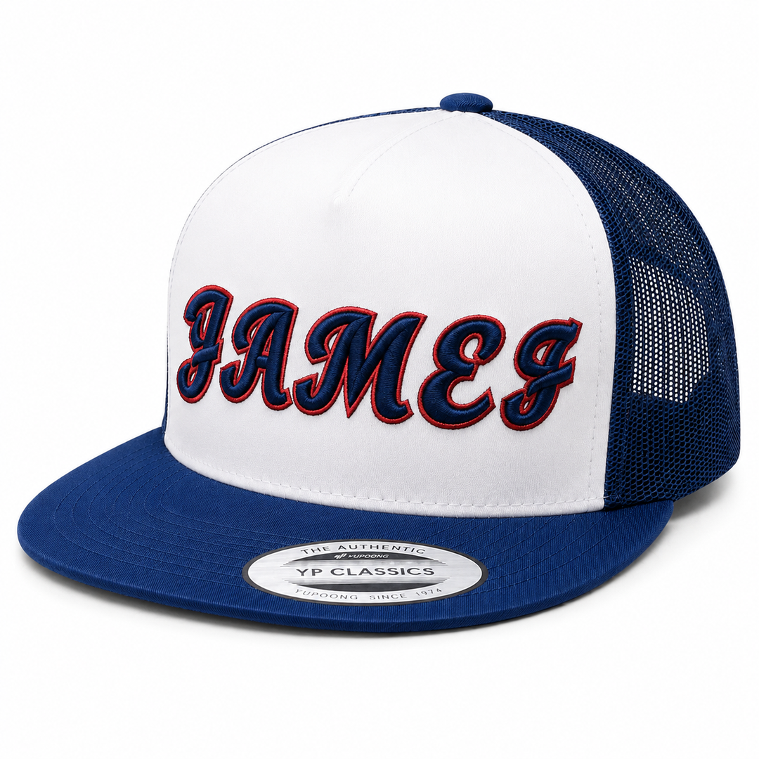 🔵🔴 Navy Ember – Monarch Script 3D Puff · Navy fill · Red outline · White/Royal Blue Two-Tone Trucker | Hand Finished in Dubai | EmbroMania