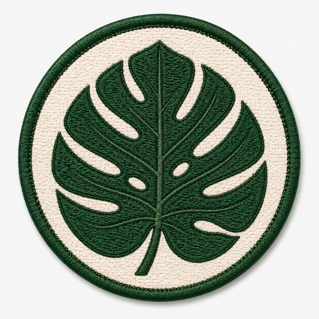 Monstera Verde embroidery patch featuring a single monstera leaf shape in flat deep green | Hand Finished in Dubai | EmbroMania