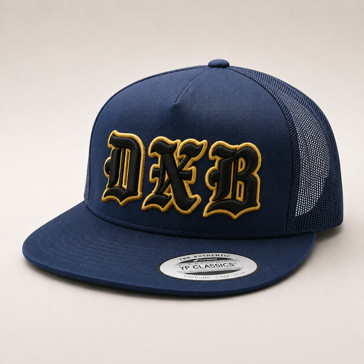 ⭐ Black Gold – Old English 3D Puff · Black fill · Gold puff outline · Dark navy flat trucker | Hand Finished in Dubai | EmbroMania