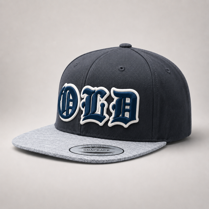 🎓 Navy White – Old English 3D Puff · Navy fill · White puff outline · Charcoal heather grey snapback | Hand Finished in Dubai | EmbroMania